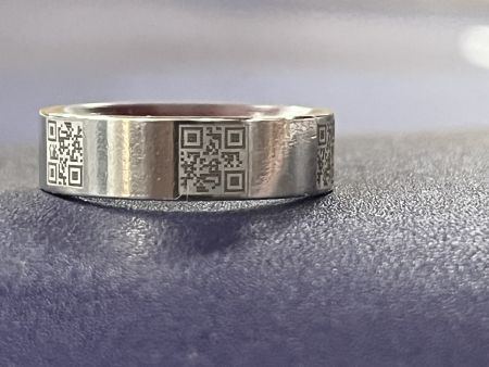 Laser Micro-Engraved Miniaturized QR Codes on Rings - Miniaturized, tiny QR codes on stainless steel rings for pet identification and animal traceability